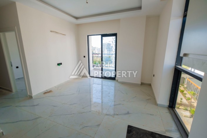 Просторная квартира 1+1 в популярном районе Махмутлар - Ракурс 10