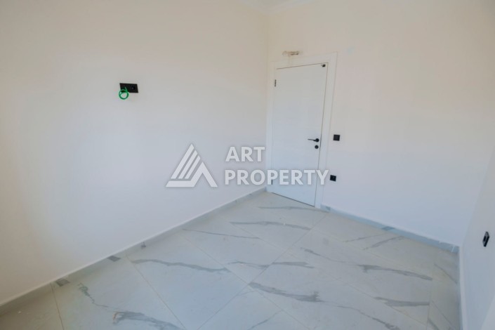 Просторная квартира 1+1 в популярном районе Махмутлар - Ракурс 11