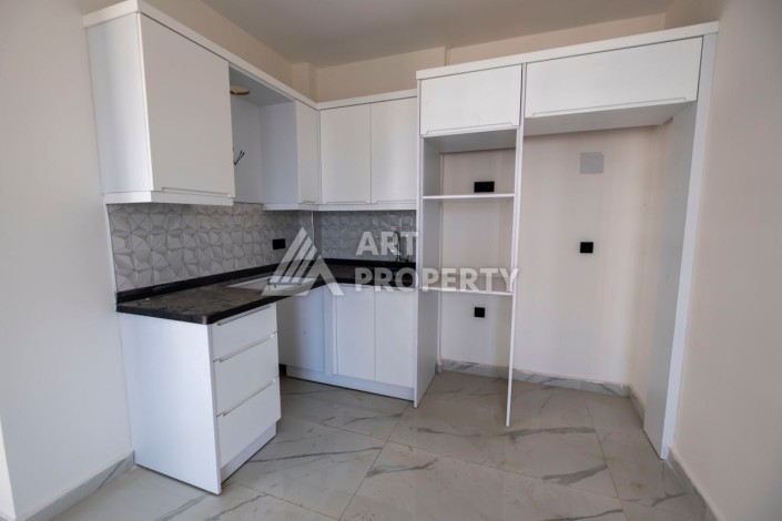 Просторная квартира 1+1 в популярном районе Махмутлар - Ракурс 13