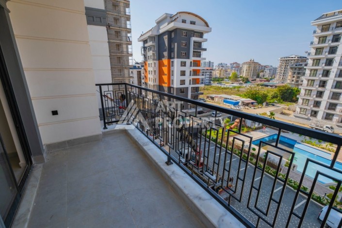 Просторная квартира 1+1 в популярном районе Махмутлар - Ракурс 16