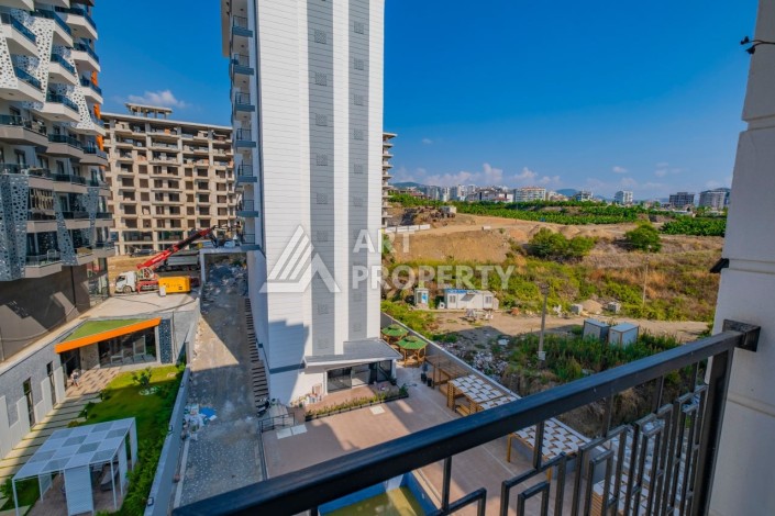 Просторная квартира 1+1 в популярном районе Махмутлар - Ракурс 17