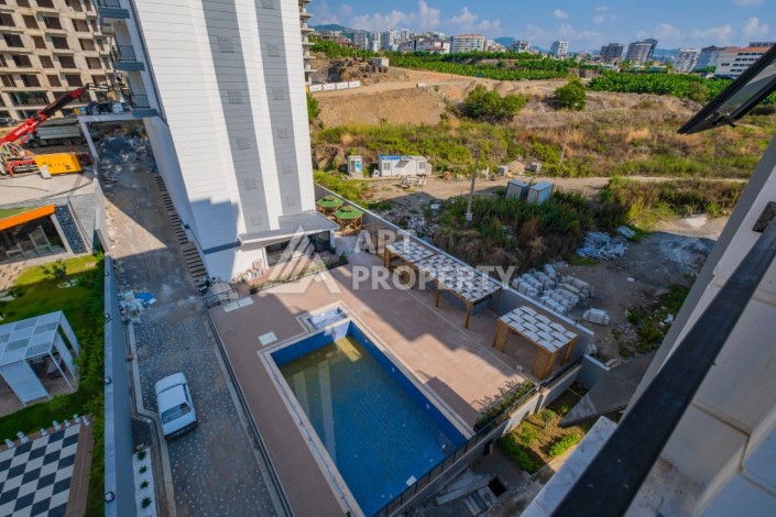 Просторная квартира 1+1 в популярном районе Махмутлар - Ракурс 19