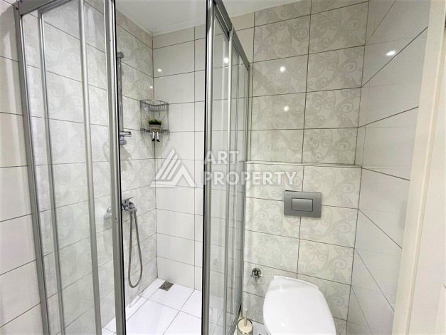 Шикарная квартира 2+1 от надежного застройщика в развитом районе Махмутлар - Ракурс 19