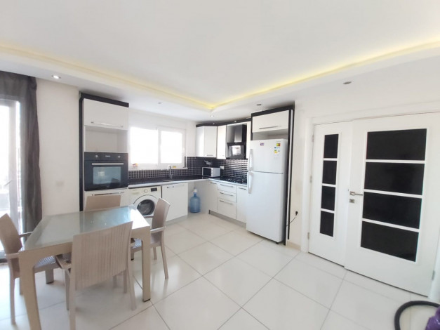 Квартира 1+1 в центральной части Махмутлара, 70 м2 - Ракурс 18