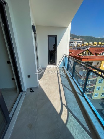 Элитная квартира 1+1 от качественного застройщика в центре Алании - Ракурс 33