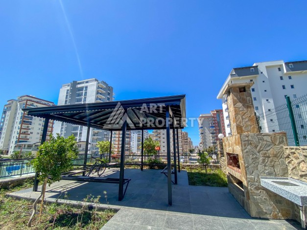 Уютная квартира 1+1 в хорошем комплексе от надежного застройщика в районе Махмутлар - Ракурс 13