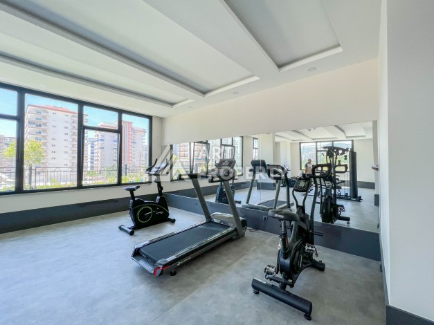 Уютная квартира 1+1 в хорошем комплексе от надежного застройщика в районе Махмутлар - Ракурс 22