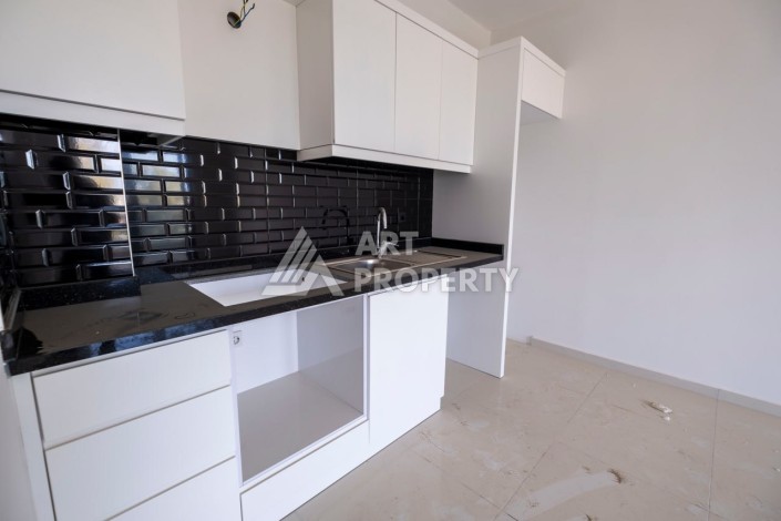 Квартира 1+1 в новом комплексе с полной инфраструктурой  в популярном районе Махмутлар - Ракурс 10