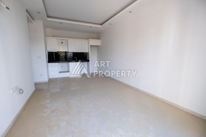 Квартира 1+1 в новом комплексе с полной инфраструктурой  в популярном районе Махмутлар - Ракурс 12