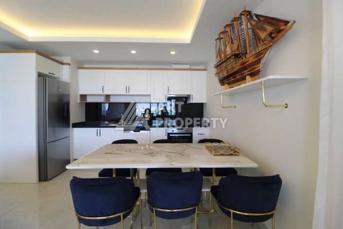 Шикарная квартира 2+1  в элитном комплексе на первой береговой линии в районе Махмутлар - Ракурс 12