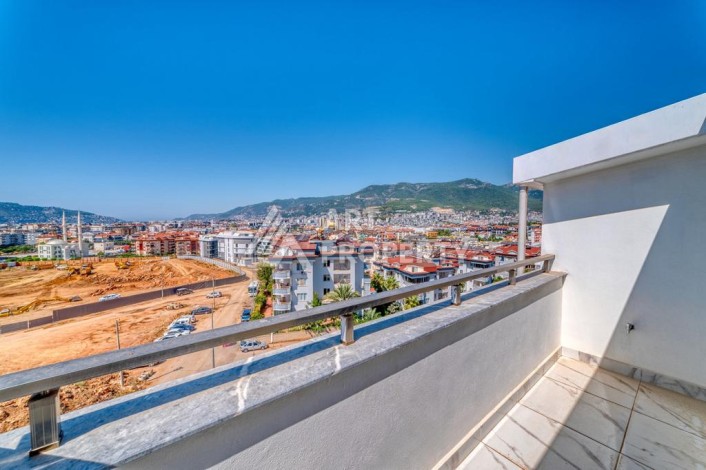 Двухуровневая видовая квартира 3+1 с новой мебелью в новом доме в Оба! - Ракурс 8