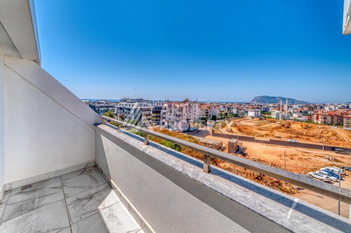 Двухуровневая видовая квартира 3+1 с новой мебелью в новом доме в Оба! - Ракурс 11