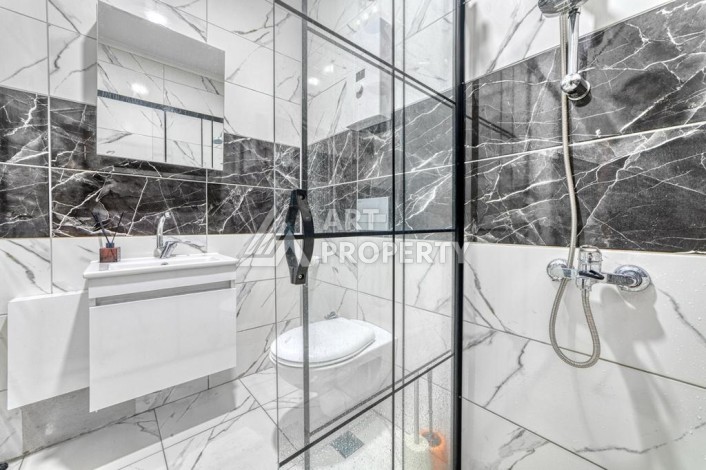 Двухуровневая видовая квартира 3+1 с новой мебелью в новом доме в Оба! - Ракурс 13