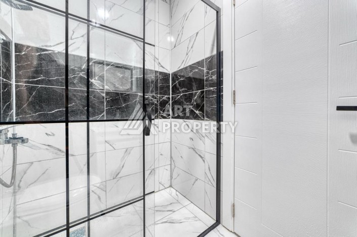 Двухуровневая видовая квартира 3+1 с новой мебелью в новом доме в Оба! - Ракурс 19