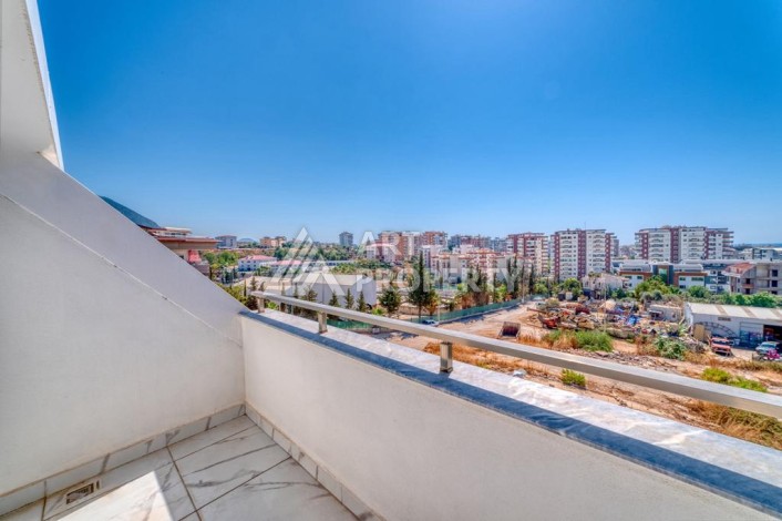 Двухуровневая видовая квартира 3+1 с новой мебелью в новом доме в Оба! - Ракурс 21