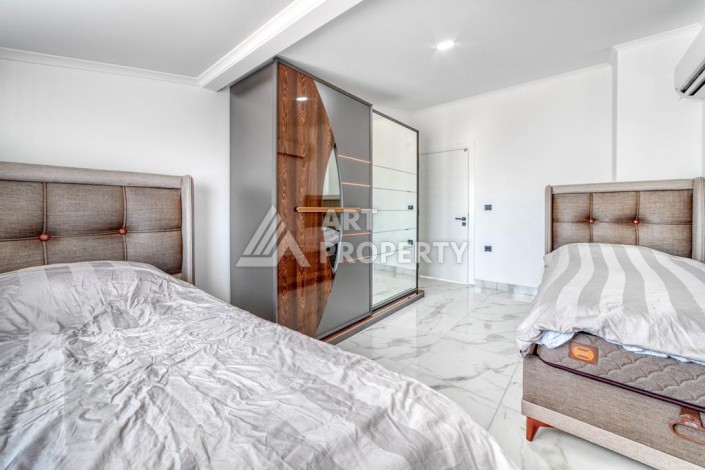 Двухуровневая видовая квартира 3+1 с новой мебелью в новом доме в Оба! - Ракурс 23