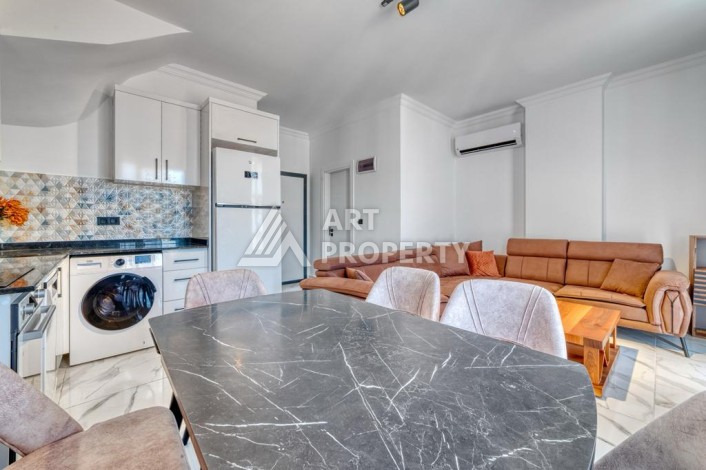 Двухуровневая видовая квартира 3+1 с новой мебелью в новом доме в Оба! - Ракурс 24