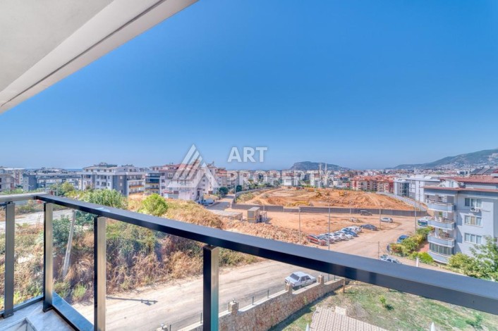 Двухуровневая видовая квартира 3+1 с новой мебелью в новом доме в Оба! - Ракурс 35