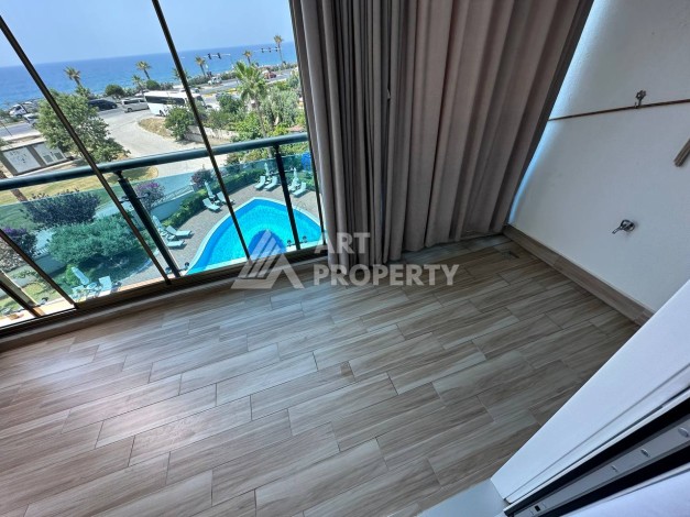 Квартира 1+1 с прямым видом на море в районе Махмутлар - Ракурс 3