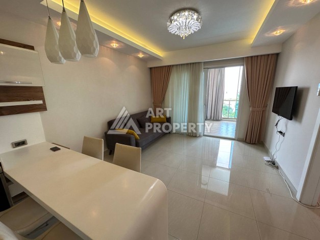 Квартира 1+1 с прямым видом на море в районе Махмутлар - Ракурс 10