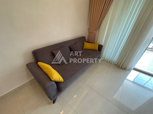 Квартира 1+1 с прямым видом на море в районе Махмутлар - Ракурс 14