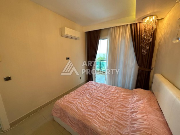 Квартира 1+1 с прямым видом на море в районе Махмутлар - Ракурс 15