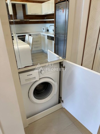 Квартира 1+1 с прямым видом на море в районе Махмутлар - Ракурс 17