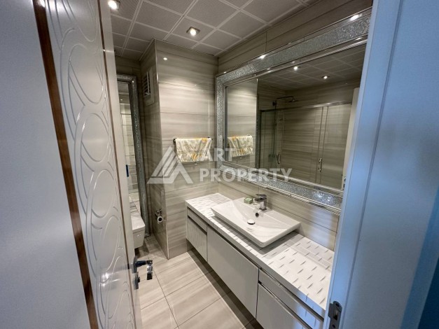 Квартира 1+1 с прямым видом на море в районе Махмутлар - Ракурс 18