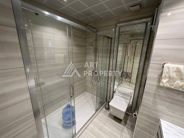 Квартира 1+1 с прямым видом на море в районе Махмутлар - Ракурс 19