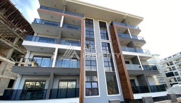 Квартира 1+1 в новом комплексе в районе Махмутлар возле моря - Ракурс 1