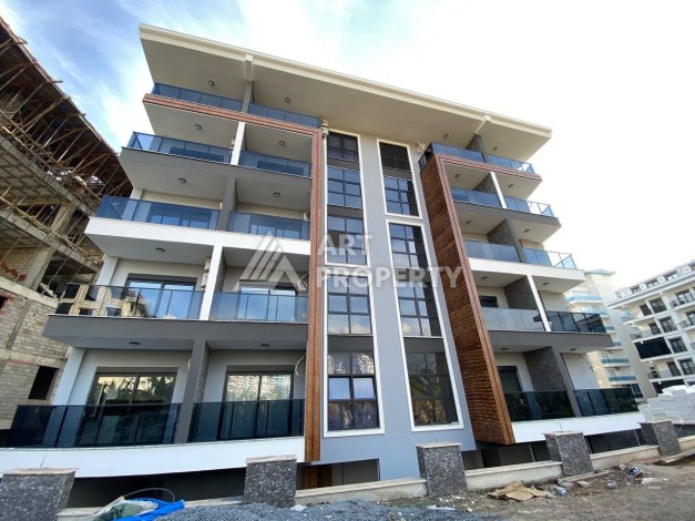 Квартира 1+1 в новом комплексе в районе Махмутлар возле моря - Ракурс 0