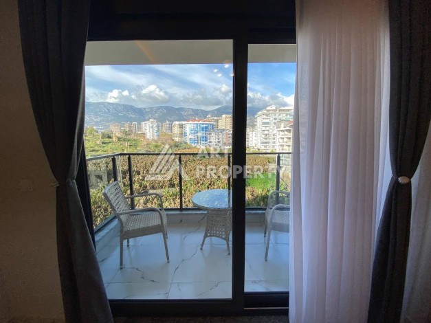 Квартира 1+1 в новом комплексе в районе Махмутлар возле моря - Ракурс 5