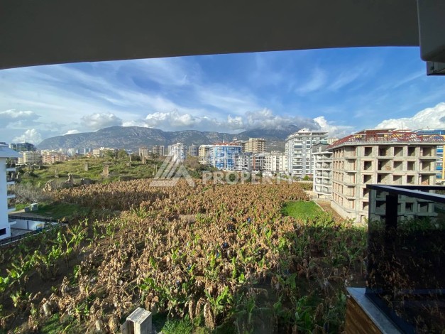 Квартира 1+1 в новом комплексе в районе Махмутлар возле моря - Ракурс 3