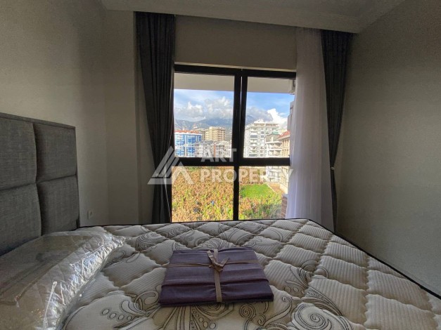 Квартира 1+1 в новом комплексе в районе Махмутлар возле моря - Ракурс 7