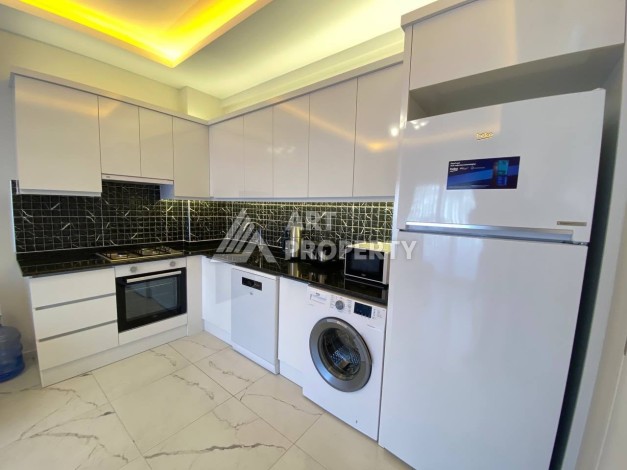 Квартира 1+1 в новом комплексе в районе Махмутлар возле моря - Ракурс 9