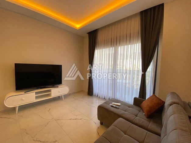 Квартира 1+1 в новом комплексе в районе Махмутлар возле моря - Ракурс 10