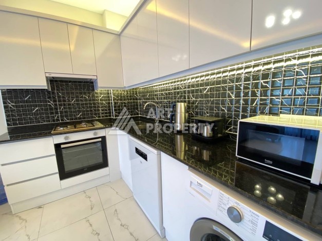 Квартира 1+1 в новом комплексе в районе Махмутлар возле моря - Ракурс 11