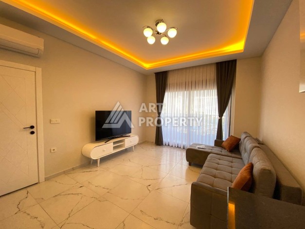 Квартира 1+1 в новом комплексе в районе Махмутлар возле моря - Ракурс 14