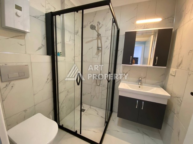 Квартира 1+1 в новом комплексе в районе Махмутлар возле моря - Ракурс 17