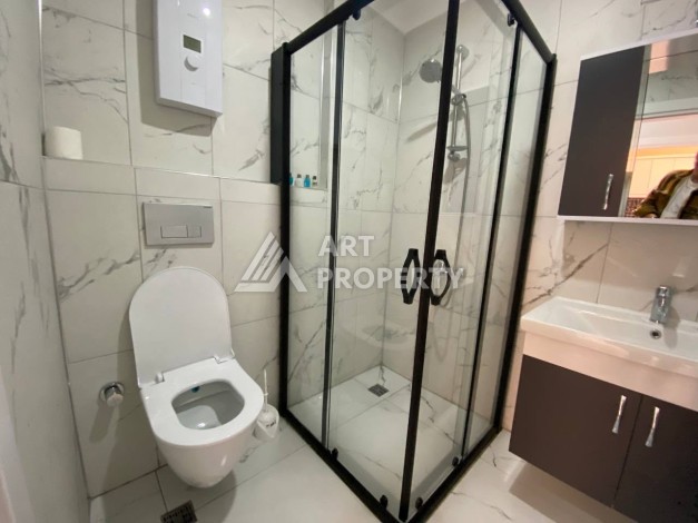 Квартира 1+1 в новом комплексе в районе Махмутлар возле моря - Ракурс 20