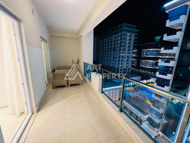 Квартира 1+1 в комплексе премиум класса от известного застройщика в районе Махмутлар - Ракурс 2