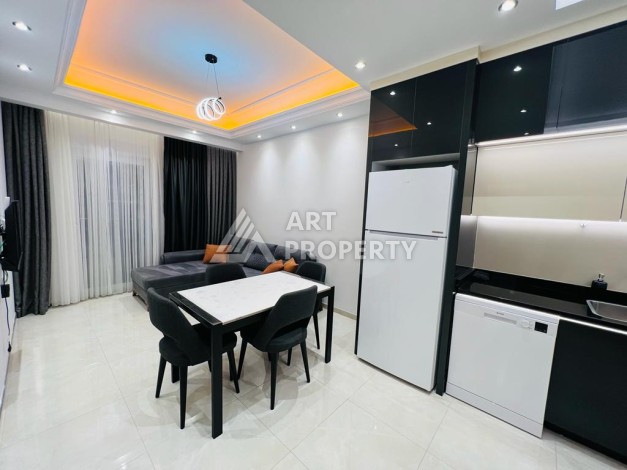 Квартира 1+1 в комплексе премиум класса от известного застройщика в районе Махмутлар - Ракурс 10