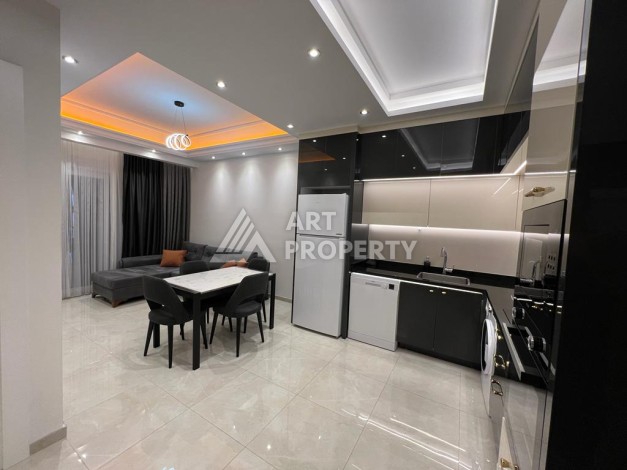 Квартира 1+1 в комплексе премиум класса от известного застройщика в районе Махмутлар - Ракурс 11