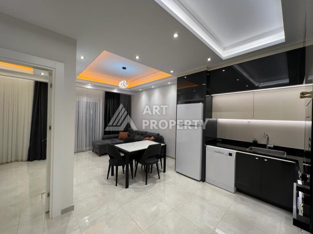 Квартира 1+1 в комплексе премиум класса от известного застройщика в районе Махмутлар - Ракурс 12