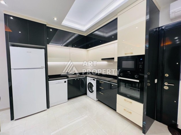 Квартира 1+1 в комплексе премиум класса от известного застройщика в районе Махмутлар - Ракурс 15