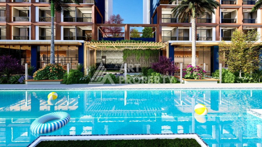 Квартиры 1+1 и студии по выгодным ценам в 600 м от моря. Мерсин,Томюк. - Ракурс 4