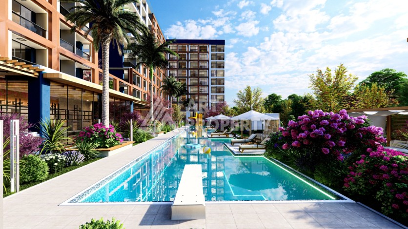 Квартиры 1+1 и студии по выгодным ценам в 600 м от моря. Мерсин,Томюк. - Ракурс 6