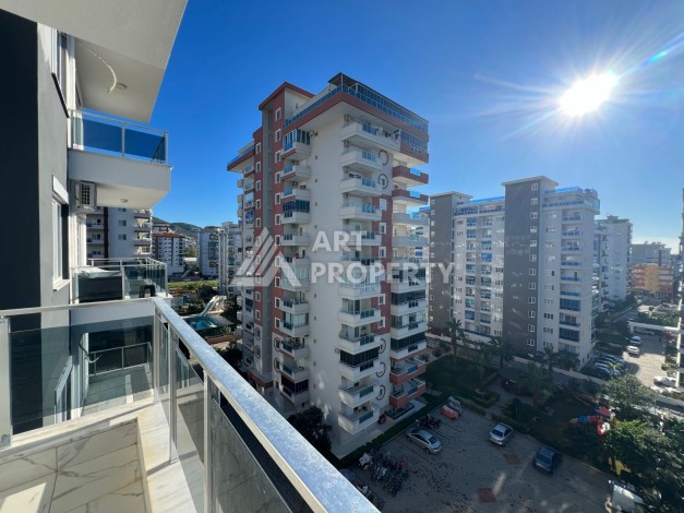 Двухкомнатная картира 48 кв.м. по горячей цене. Махмутлар, Алания. - Ракурс 15