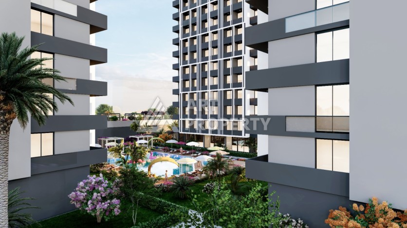 Квартиры 1+1 и 2+1 от 63 кв.м. в прекрасном районе Арпачбахшиш, Мерсин. - Ракурс 3