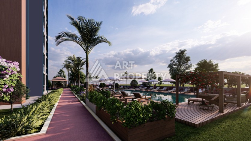 Проект с квартирами 2+1 под гражданство в Мерсине, район Томюк. - Ракурс 2